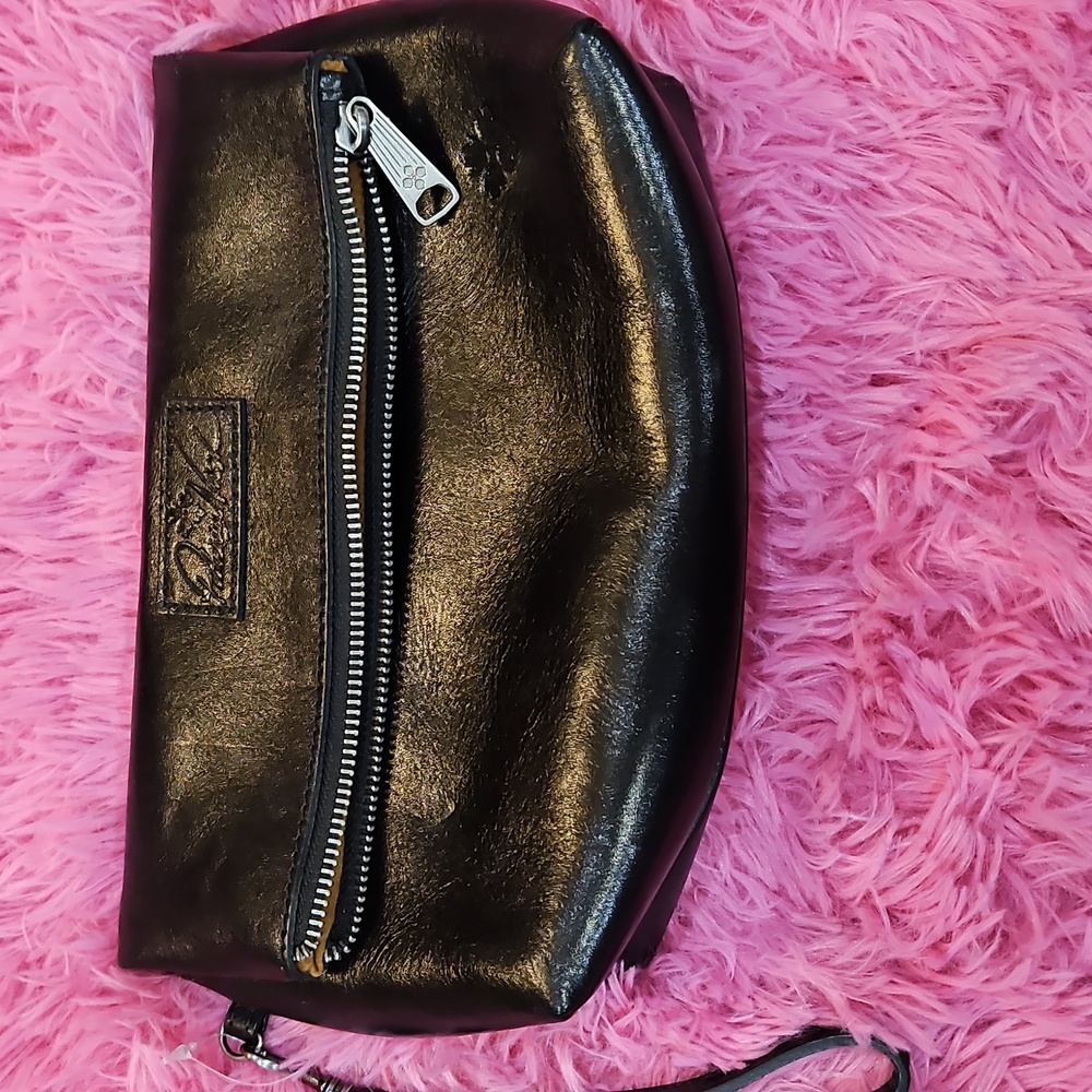 PATRICIA NASH: VALERIE GLAZED LEATHER FOLDINGWRISTLET. BLACK